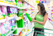 Photo: Woman buys washing powder Woman buys washing powder