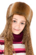 The girl in a winter fur-cap