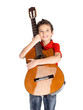 Smiling boy is playing the acoustic guitar