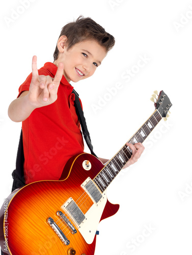 Photo: Portrait of young boy with a electric guitar Portrait of young boy with a electric guitar
