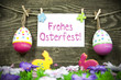 Ostereieranhänger mit Karte und Osterwiese mit Hasen