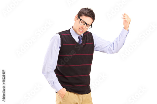 Photo: A nervous young man gesturing A nervous young man gesturing