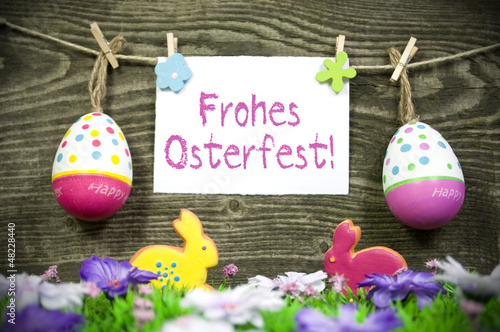 Photo: Ostereieranhänger mit Karte und Osterwiese mit Hasen Ostereieranhänger mit Karte und Osterwiese mit Hasen