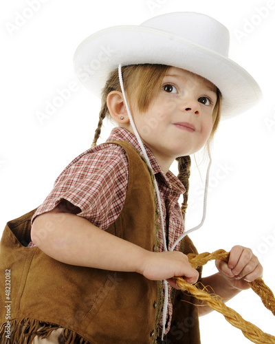 Photo: Looking Up at a Young Riding Cowgirl Looking Up at a Young Riding Cowgirl