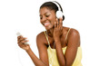 Happy African American woman listening to music