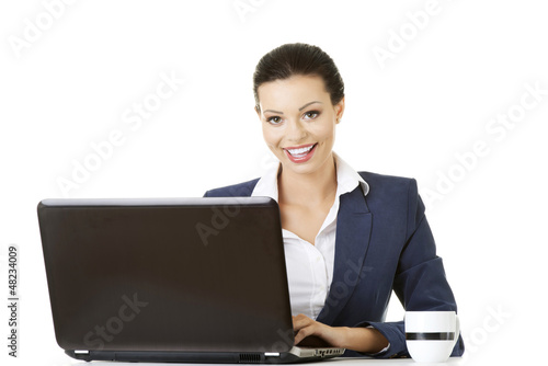 Photo: Beautiful businesswoman at work. Beautiful businesswoman at work.