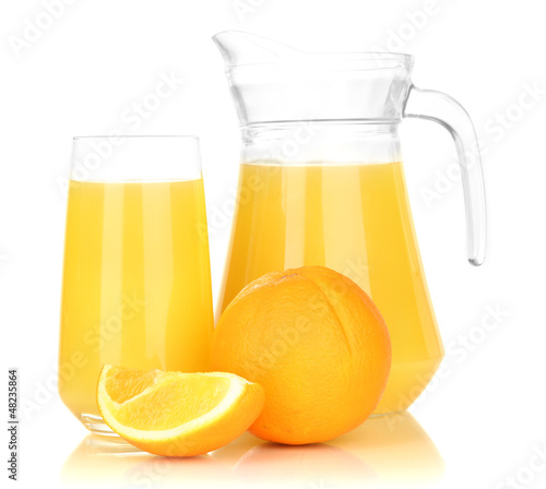 Photo: Full glass and jug of orange juice and oranges isolated on Full glass and jug of orange juice and oranges isolated on