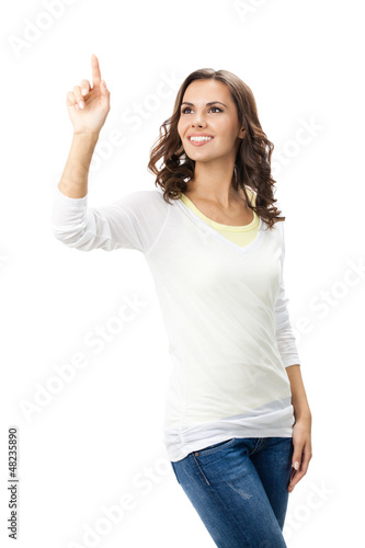 Photo: Beautiful young woman showing blank signboard Beautiful young woman showing blank signboard