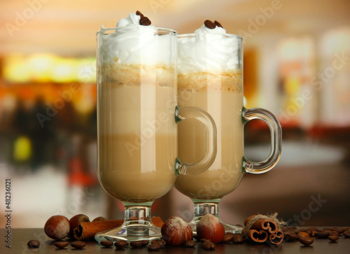Photo: Fragrant coffee latte in glasses cups with spices, Fragrant coffee latte in glasses cups with spices,