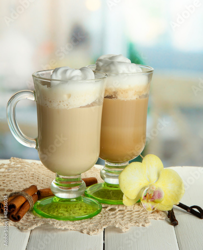 Photo: Fragrant coffee latte in glasses cups with spices, Fragrant coffee latte in glasses cups with spices,