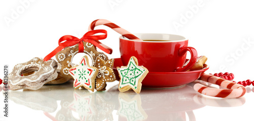 Photo: Christmas treats with cup of coffe isolated on white Christmas treats with cup of coffe isolated on white