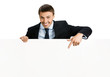 Photo: Happy businessman showing signboard, isolated Happy businessman showing signboard, isolated