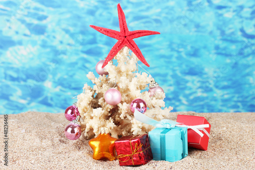 Photo: Conceptual photo: Celebrating Christmas at beach Conceptual photo: Celebrating Christmas at beach
