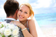 Bride embracing her groom