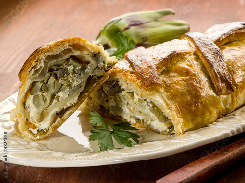 Photo: strudel with artichoke and ricotta, vegetarian food strudel with artichoke and ricotta, vegetarian food