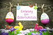 Photo: Ostereieranhänger mit Karte und Osterwiese mit Hasen Ostereieranhänger mit Karte und Osterwiese mit Hasen