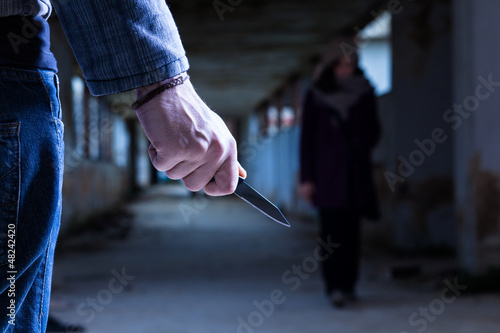 Photo: Criminal with Knife Waiting for a Woman Criminal with Knife Waiting for a Woman