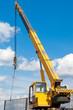 Photo: Installation of a fence by a mobile crane Installation of a fence by a mobile crane