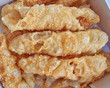 Diples, traditional Greek sweet fries with honey syrup and nuts