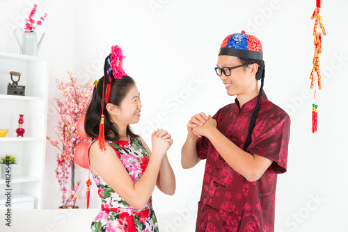 Photo: Asian people greeting during Chinese New Day Asian people greeting during Chinese New Day