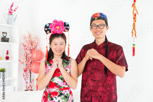 Photo: Asian people blessing during Chinese New Day Asian people blessing during Chinese New Day