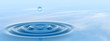 Conceptual blue water drop falling background