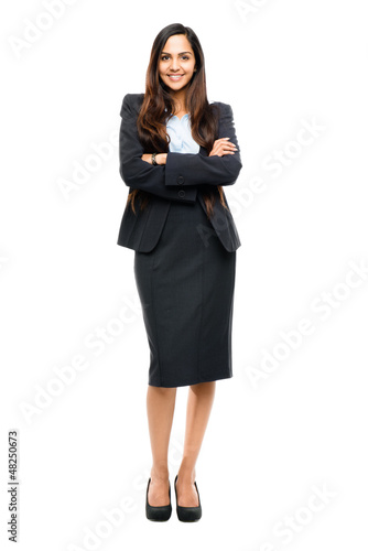 Photo: Full length portrait of attractive Indian businesswoman arms fol Full length portrait of attractive Indian businesswoman arms fol
