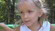 Child Swinging on a Swing, Little Girl Playing in Park
