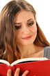 Young woman reading a book isolated on white