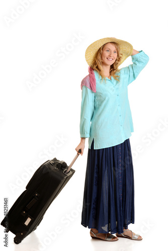 Photo: young woman traveling with luggage young woman traveling with luggage
