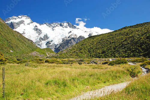 Photo: Trekking in Mt. Cook national park, New Zealand Trekking in Mt. Cook national park, New Zealand