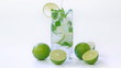 Mojito cocktail with halves of limes