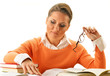 Young woman reading a book. Female student learning
