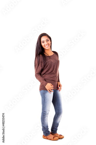 Photo: Beautiful mix race woman posing over white background Beautiful mix race woman posing over white background