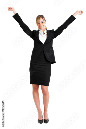 Photo: Portrait of happy woman, with arms raised in sign of victory Portrait of happy woman, with arms raised in sign of victory