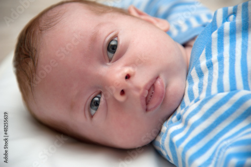 Photo: Baby boy lying down Baby boy lying down