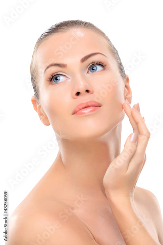 Photo: Beauty face of beautiful woman with clean fresh skin - isolated Beauty face of beautiful woman with clean fresh skin - isolated