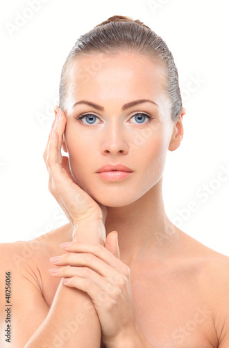 Photo: Beauty face of beautiful woman with clean fresh skin - isolated Beauty face of beautiful woman with clean fresh skin - isolated