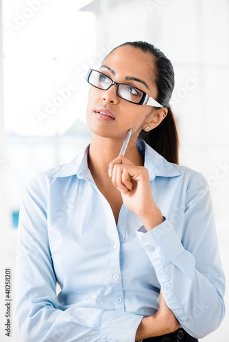 Photo: Indian business woman thinking future Indian business woman thinking future