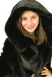 Pretty young girl in a mink coat.