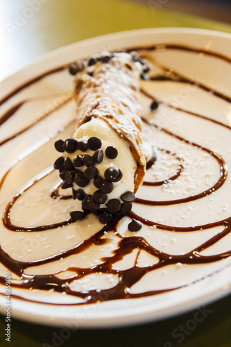 Photo: Classic Cannoli with Chocolate Sauce Classic Cannoli with Chocolate Sauce