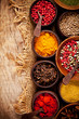Various kind of spices in wooden bowls