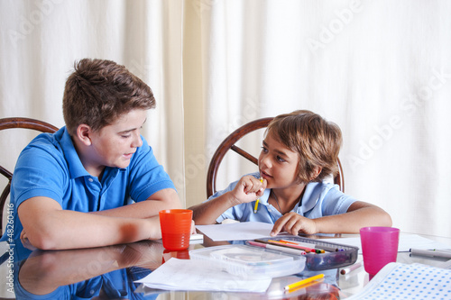 Photo: Helping with homework Helping with homework