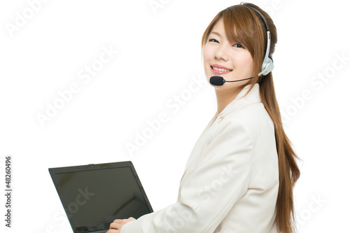 Photo: Beautiful asian business operator on white background Beautiful asian business operator on white background