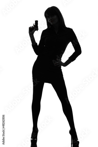 Photo: sexy detective woman holding aiming gun silhouette sexy detective woman holding aiming gun silhouette