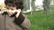 Young boy talking on the phone