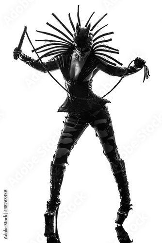 Photo: woman in catwoman leather latex fetish wear silhouette woman in catwoman leather latex fetish wear silhouette