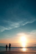 Photo: Girls on beautiful beach during sunset. Girls on beautiful beach during sunset.