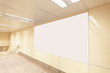 Blank billboard in subway station