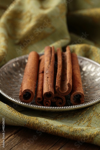Photo: Cinnamon sticks and powder cinnamon Cinnamon sticks and powder cinnamon
